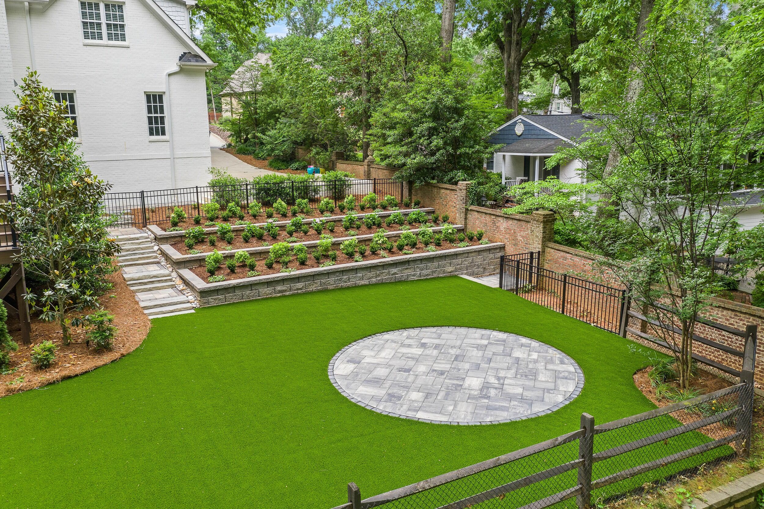 Backyard-turf-lawn-patio-terraced-garden